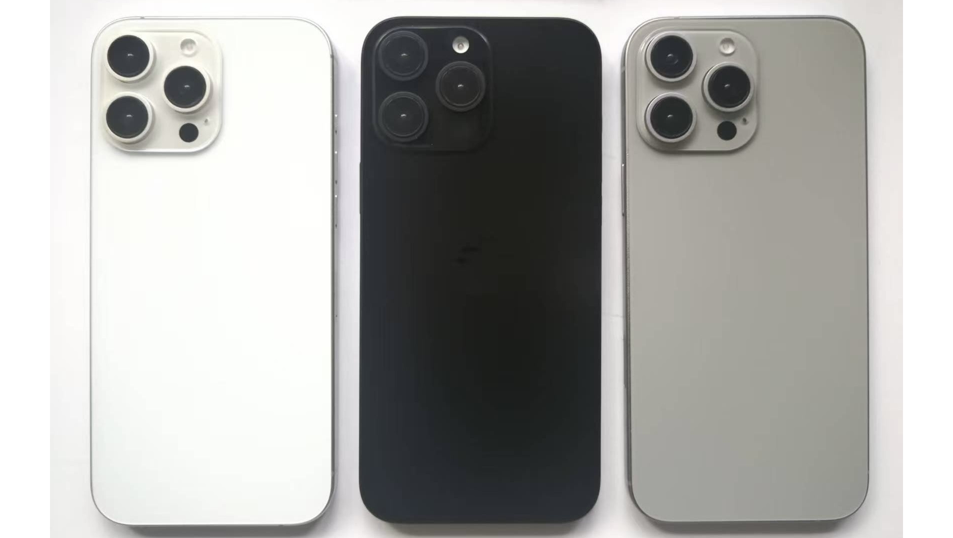 A leaked photo of three iPhone 16 Pro Max dummy units