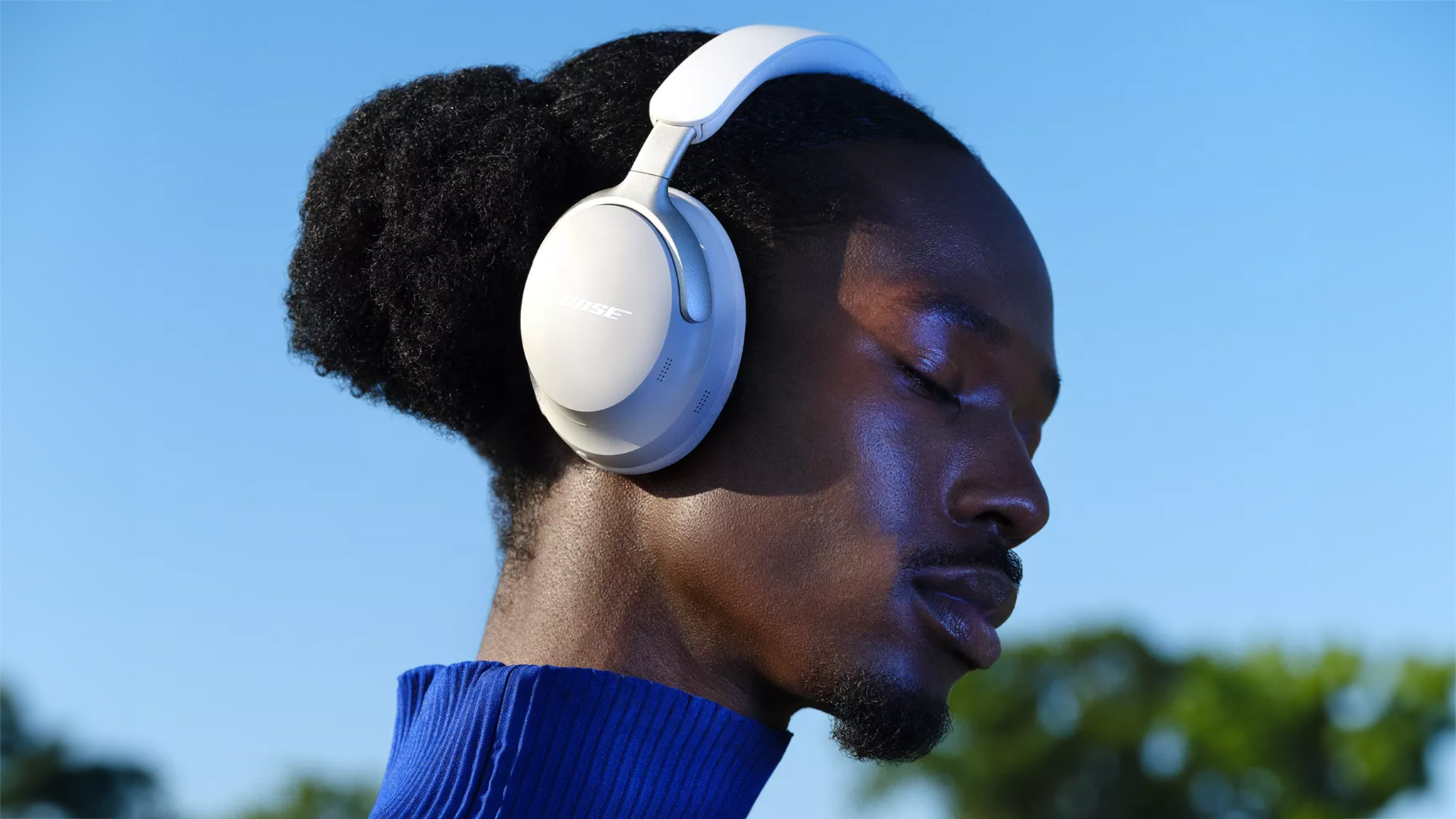 Man wearing Bose QuietComfort Ultra Headphones.