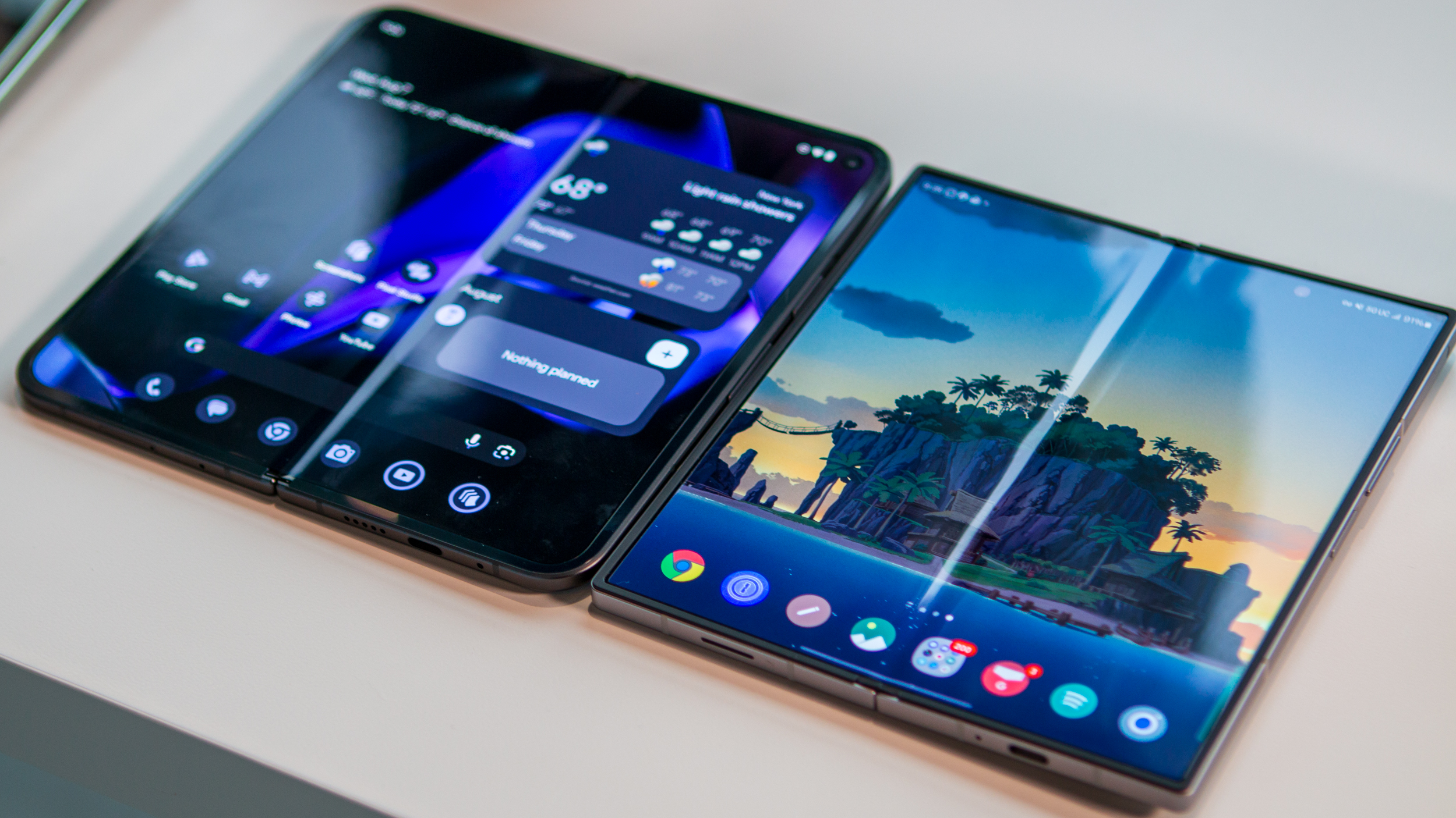 Pixel 9 Pro Fold and Galaxy Z Fold 6 side-by-side with screens open