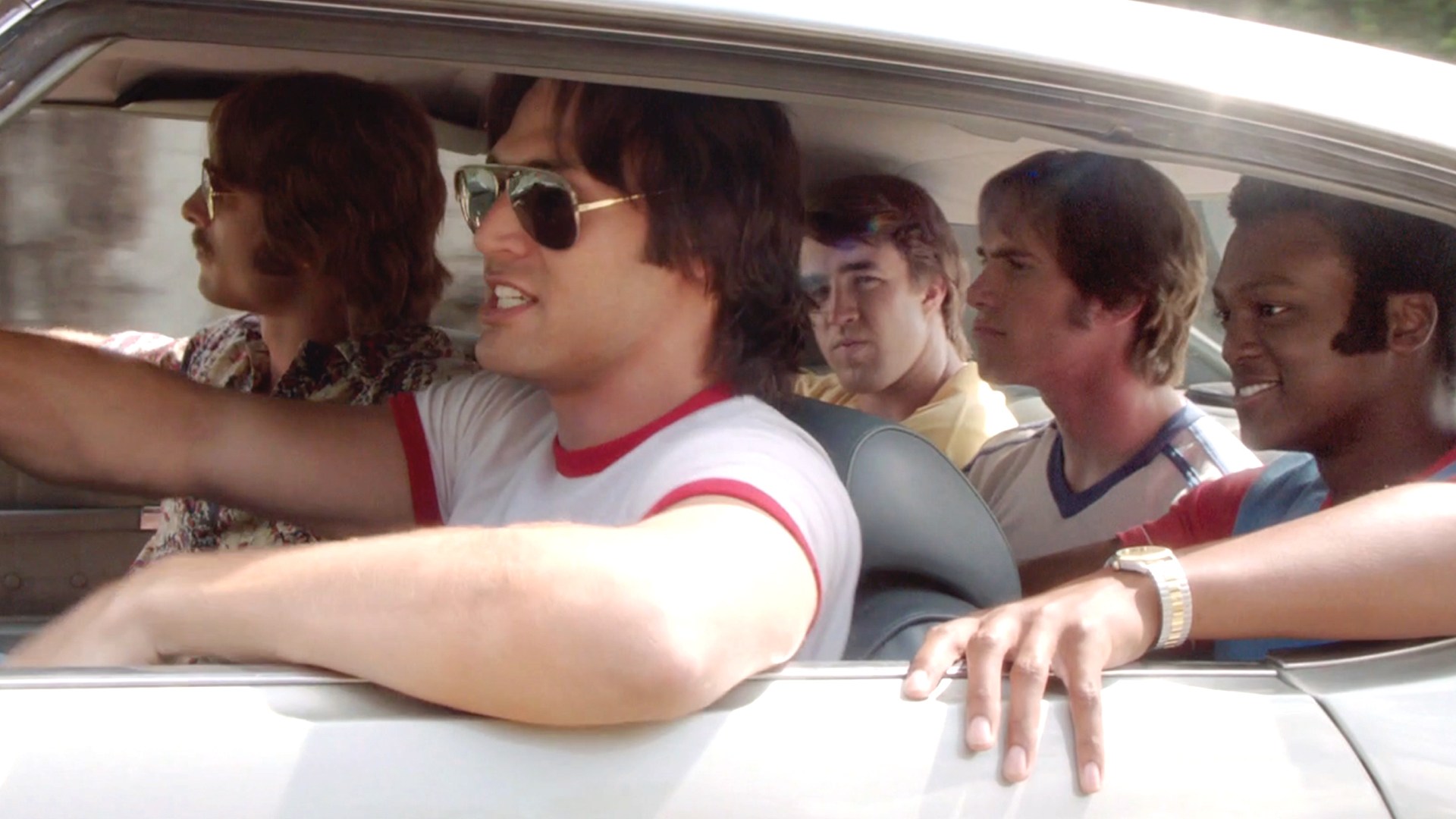 A group of men sitting in a car in Everybody Wants Some!!