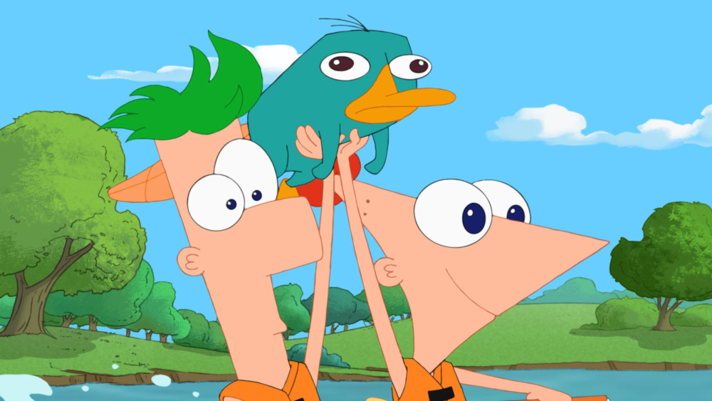 Phineas and Ferb holding a blue platypus, Perry