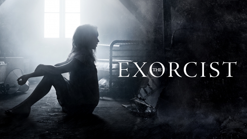 The Exorcist poster. A possessed girl's head is facing the opposite direction to her body.