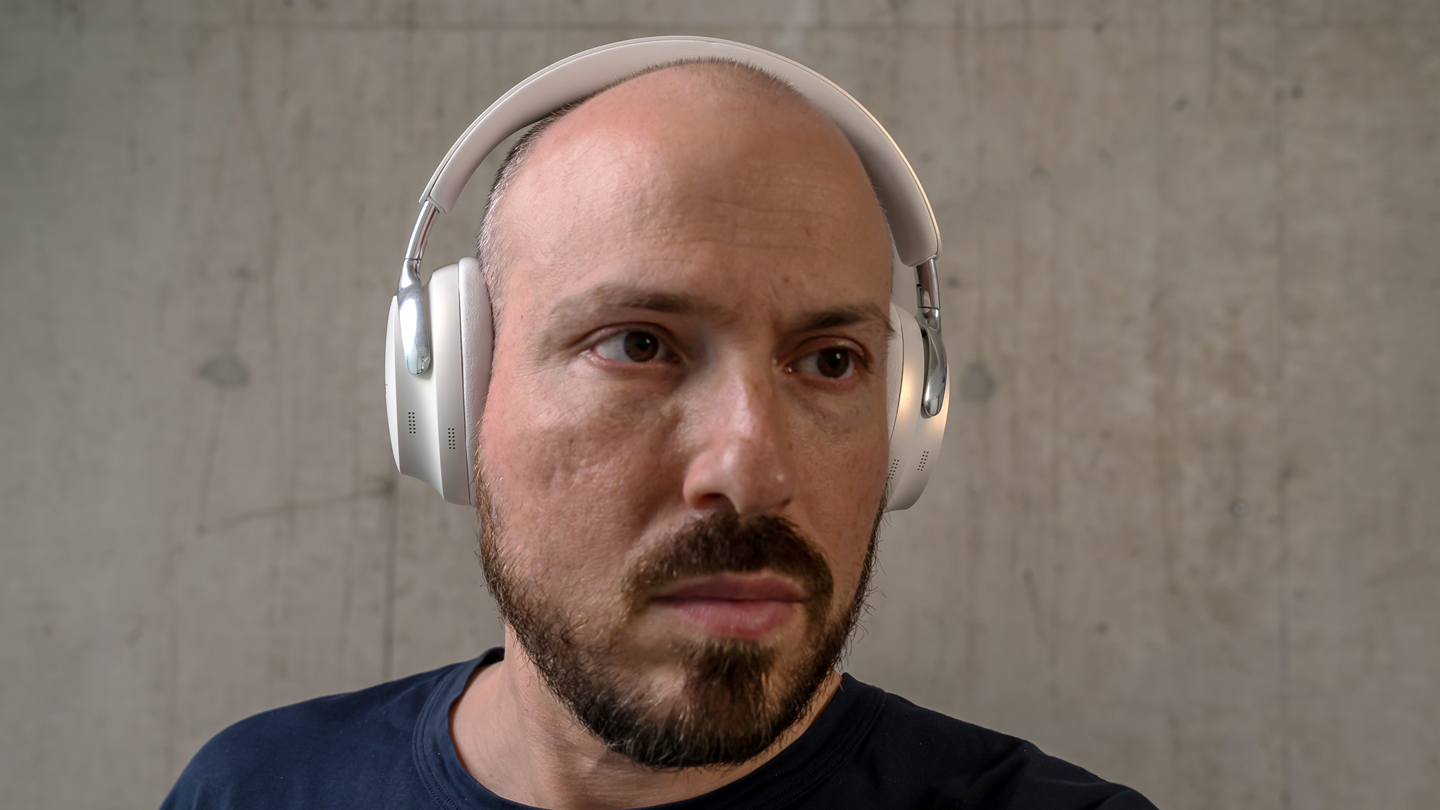 Front view of the Bose QuietComfort Ultra headphones being worn.