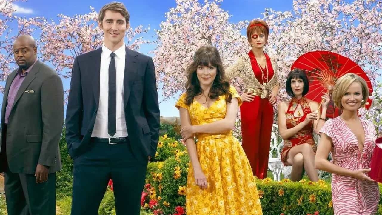 A promo image for Pushing Daisies, which shows the main cast smiling at the camera