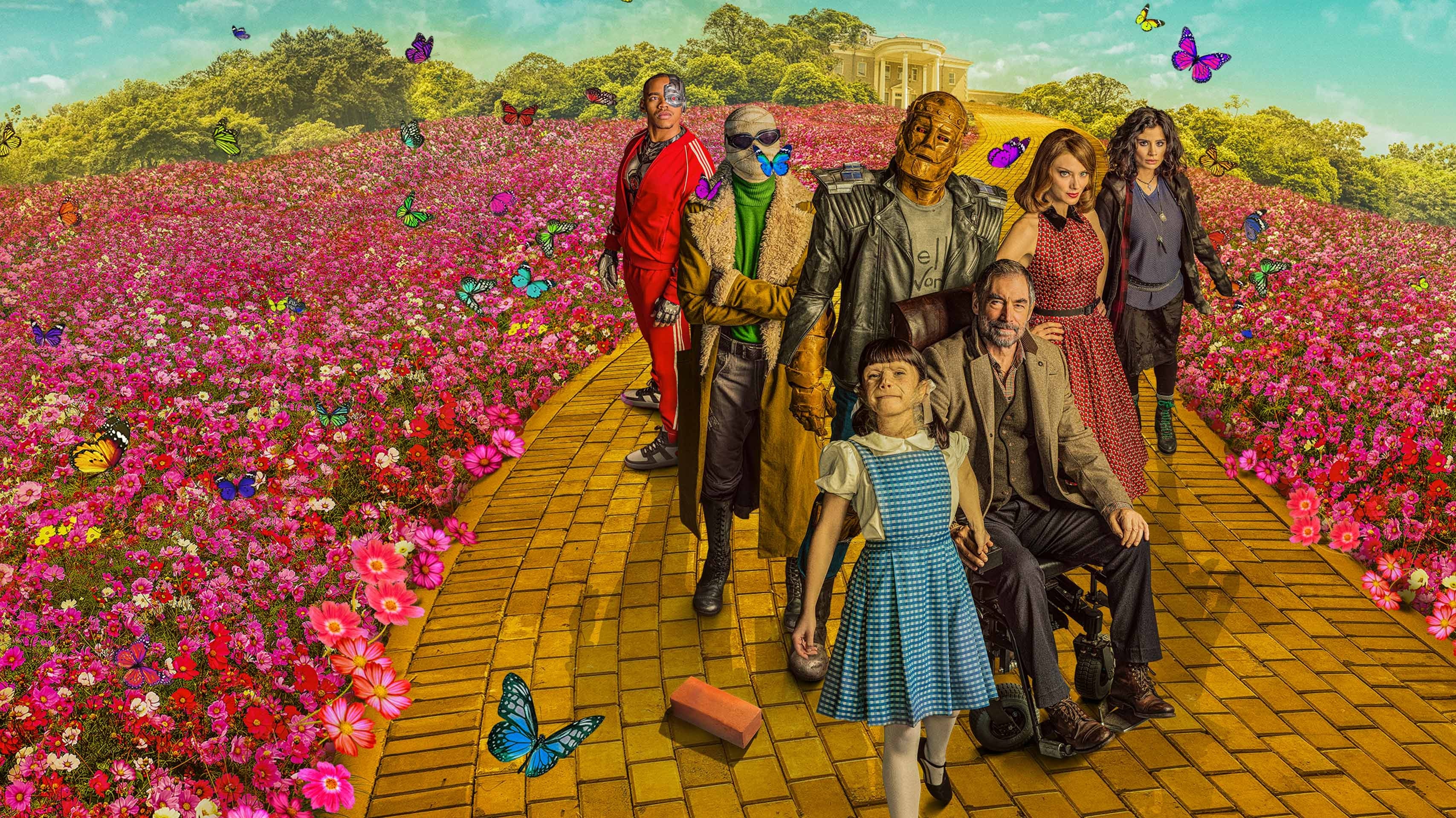 The Doom Patrol cast on a Wizard of Oz-like yellow brick road