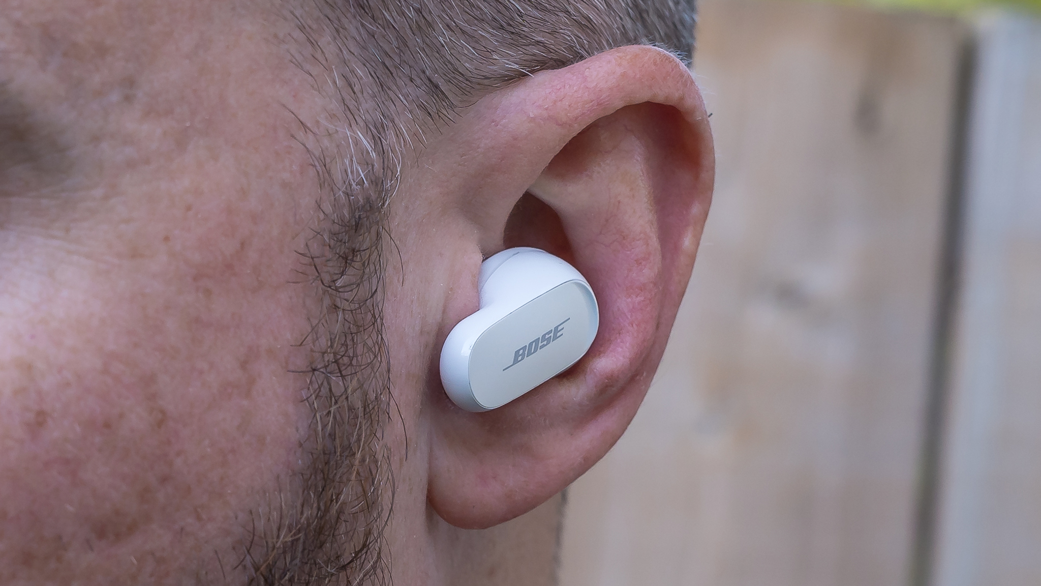 Close-up view of Bose QuietComfort Ultra left earbud.