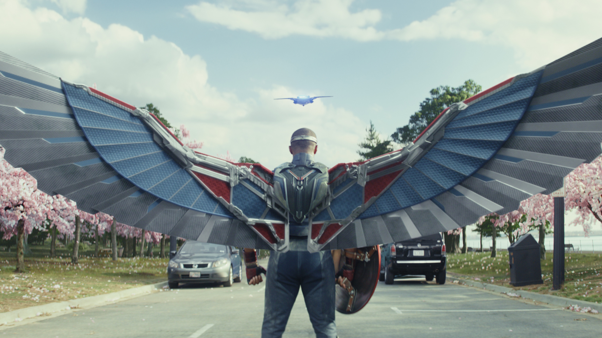 A back shot of Sam Wilson's Captain America looking down a highway in Captain America: Brave New World