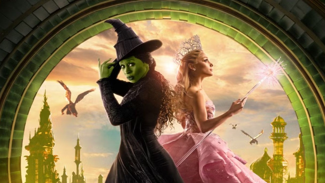 Elphaba and Glinda standing back to back in a press image for Wicked Part One