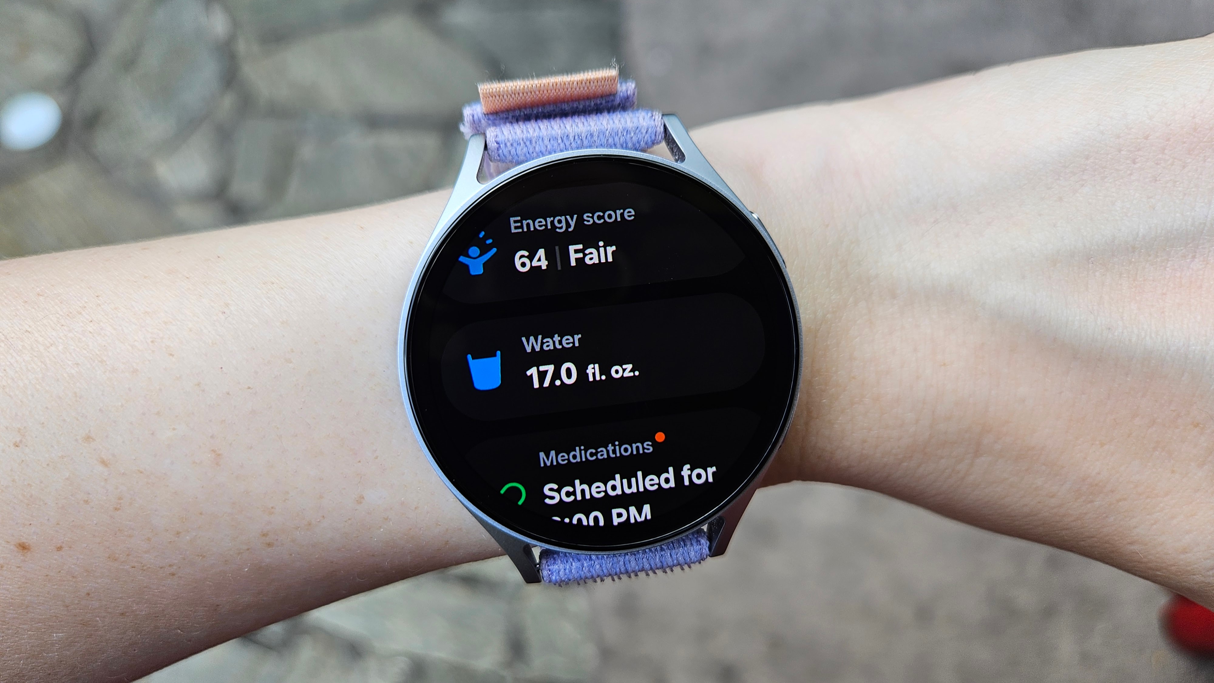 The Samsung Galaxy Watch 7 showing water monitoring and energy scores in Samsung Health