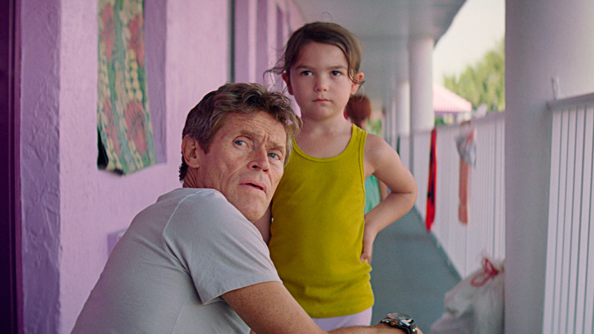 Willem Dafoe and Brooklynn Prince staring off-camera in Sean Baker's The Florida Project