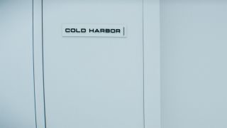 A white door with the sign Cold Harbor on it in Severance season 2