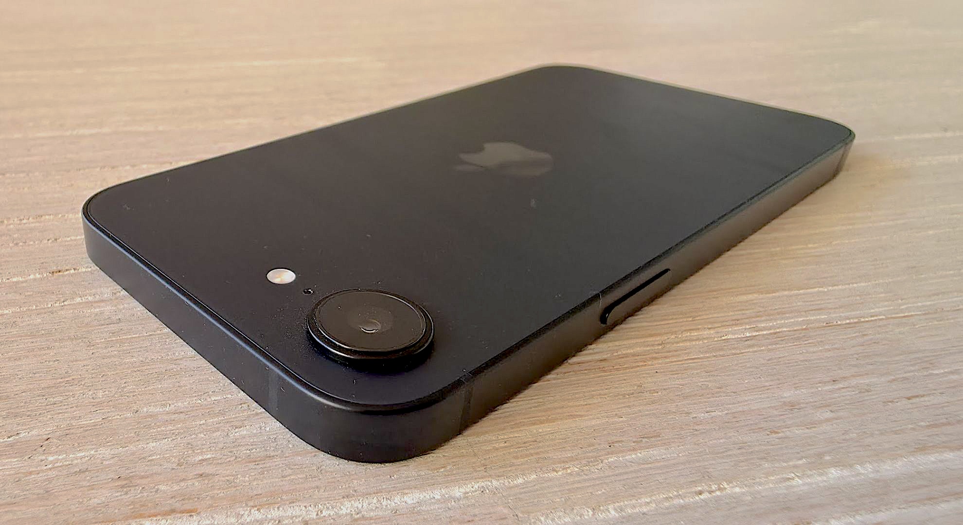 The iPhone 16e from the back with its camera showing