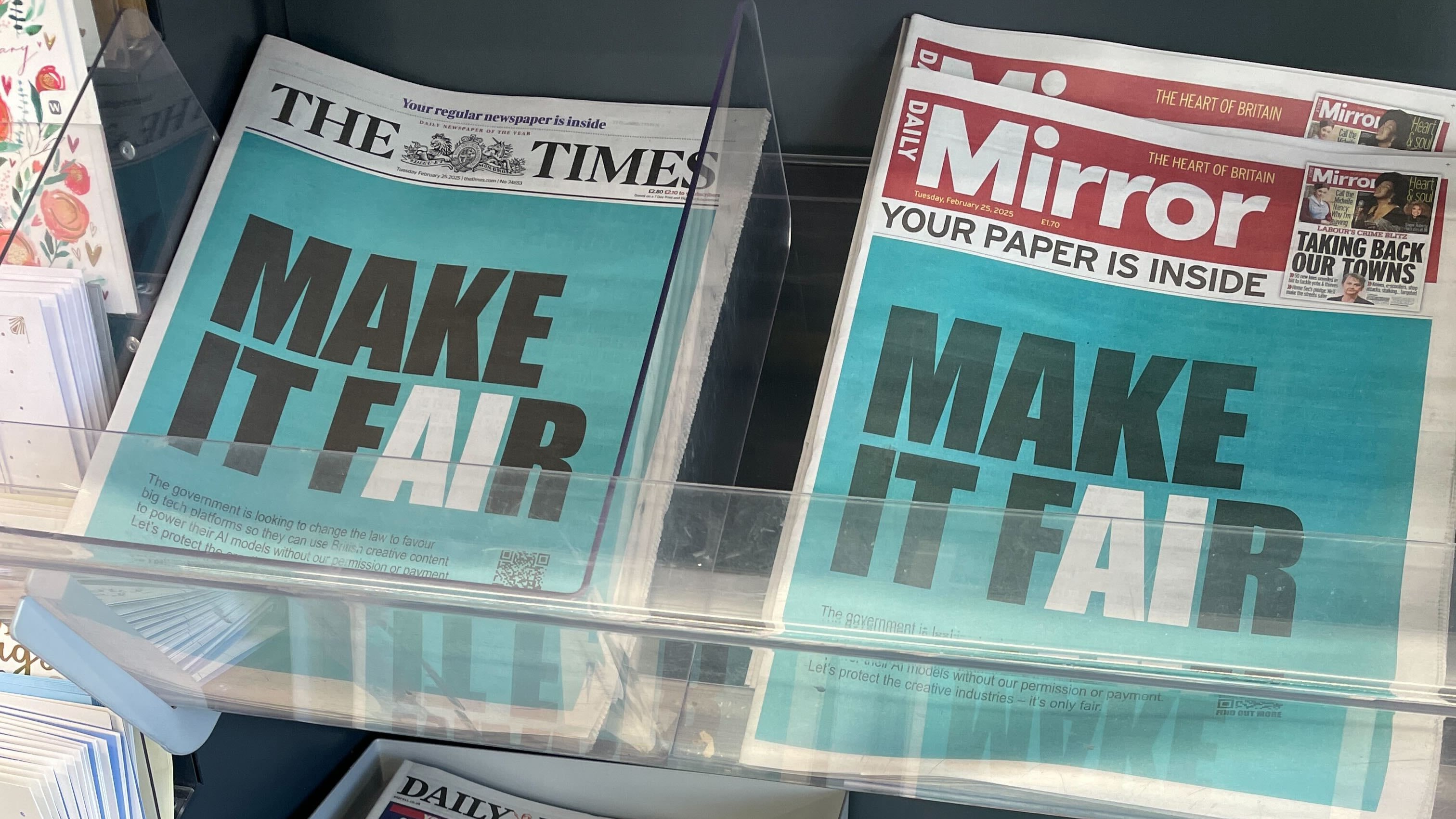 The Times and Daily Mirror newspapers with the Make It Fair campaign ad on the front page