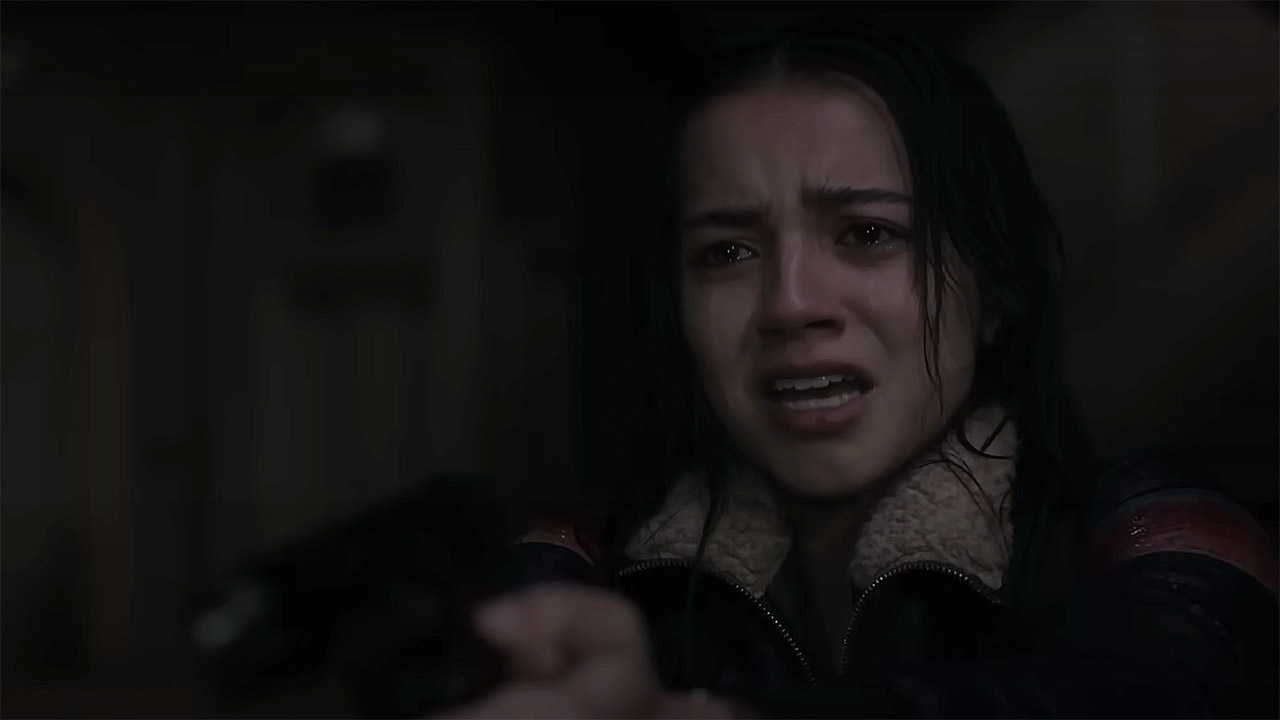 An upset Dina holding an off-screen Ellie at gunpoint in The Last of Us season 2 episode 4