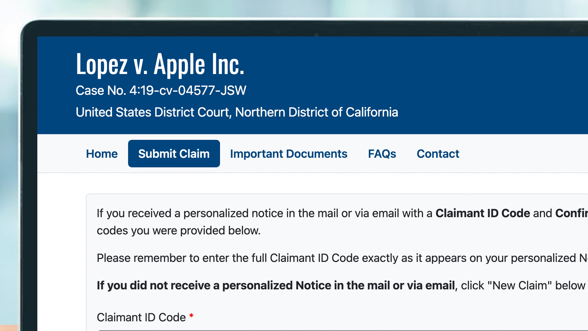 A laptop screen showing the claim form for the 'Lopez vs Apple Inc' lawsuit settlement