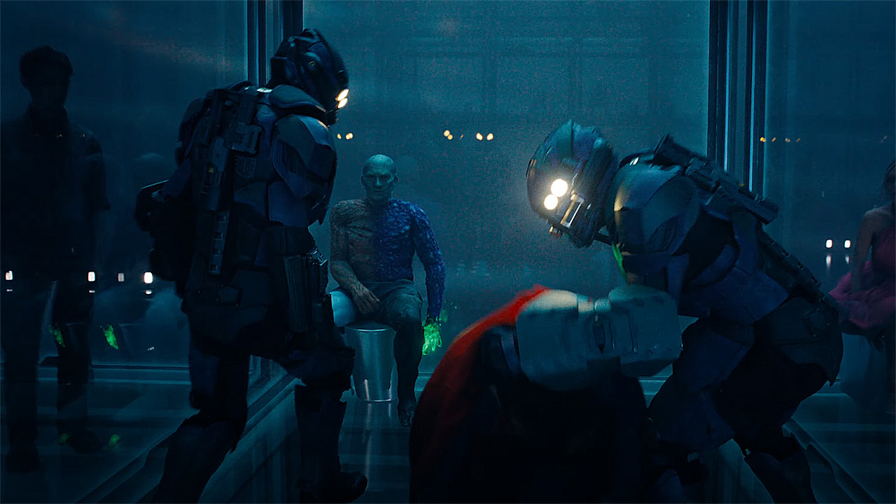 Superman being attacked by guards while Metamorpho watches on in 2025's Superman movie