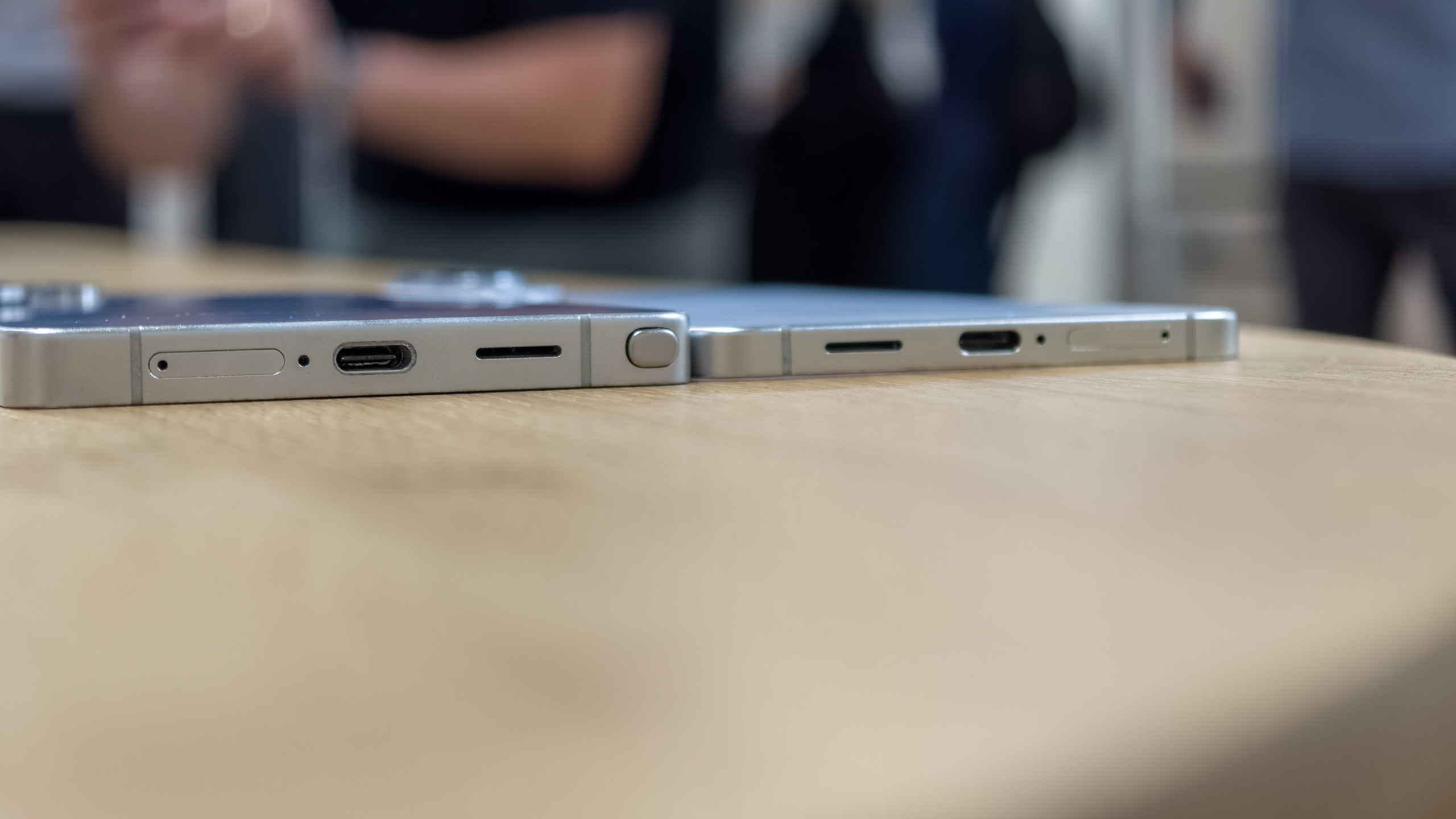 The Galaxy S25 Edge lying flat next to the Galaxy S25 Ultra.