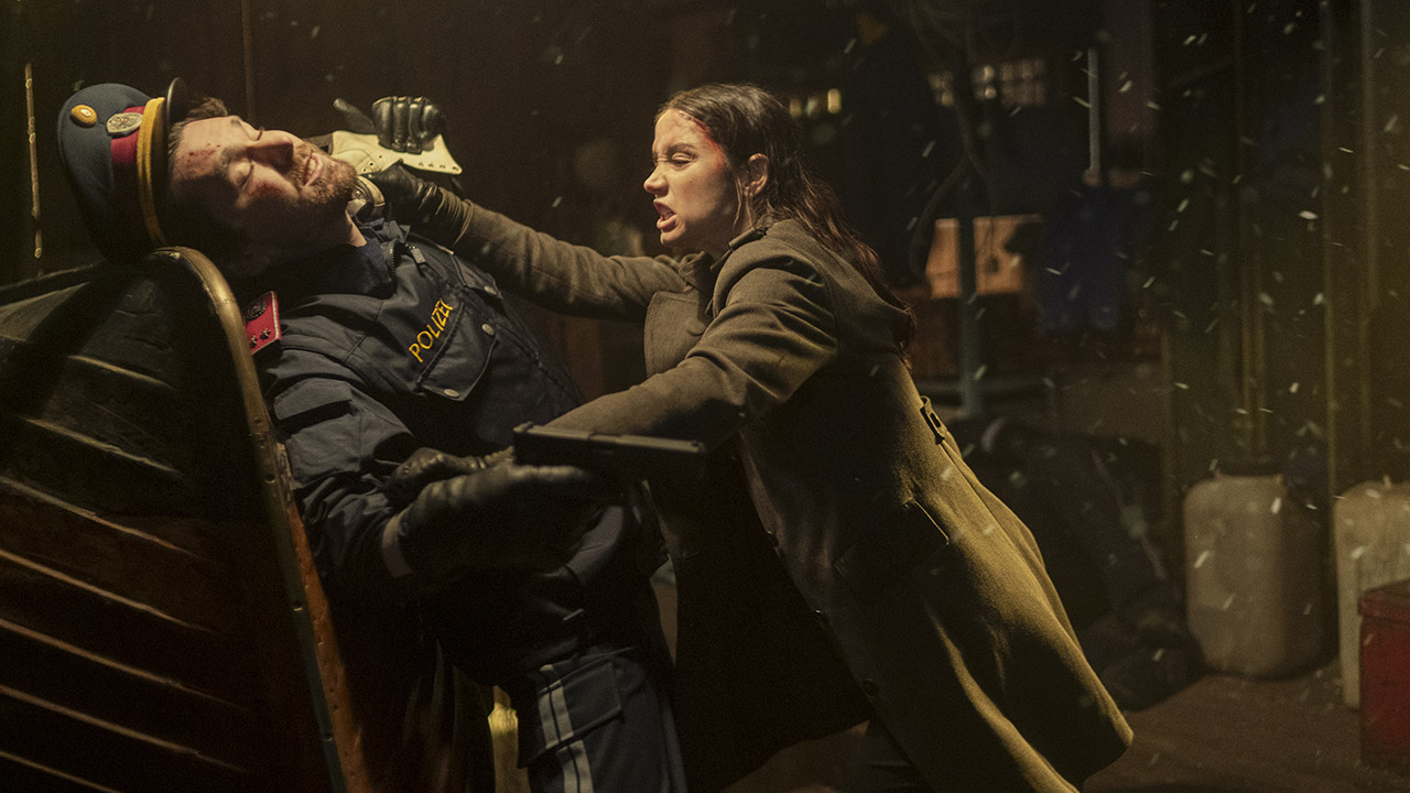 Eve stabbing an enemy with an ice skate blade in From the World of John Wick: Ballerina