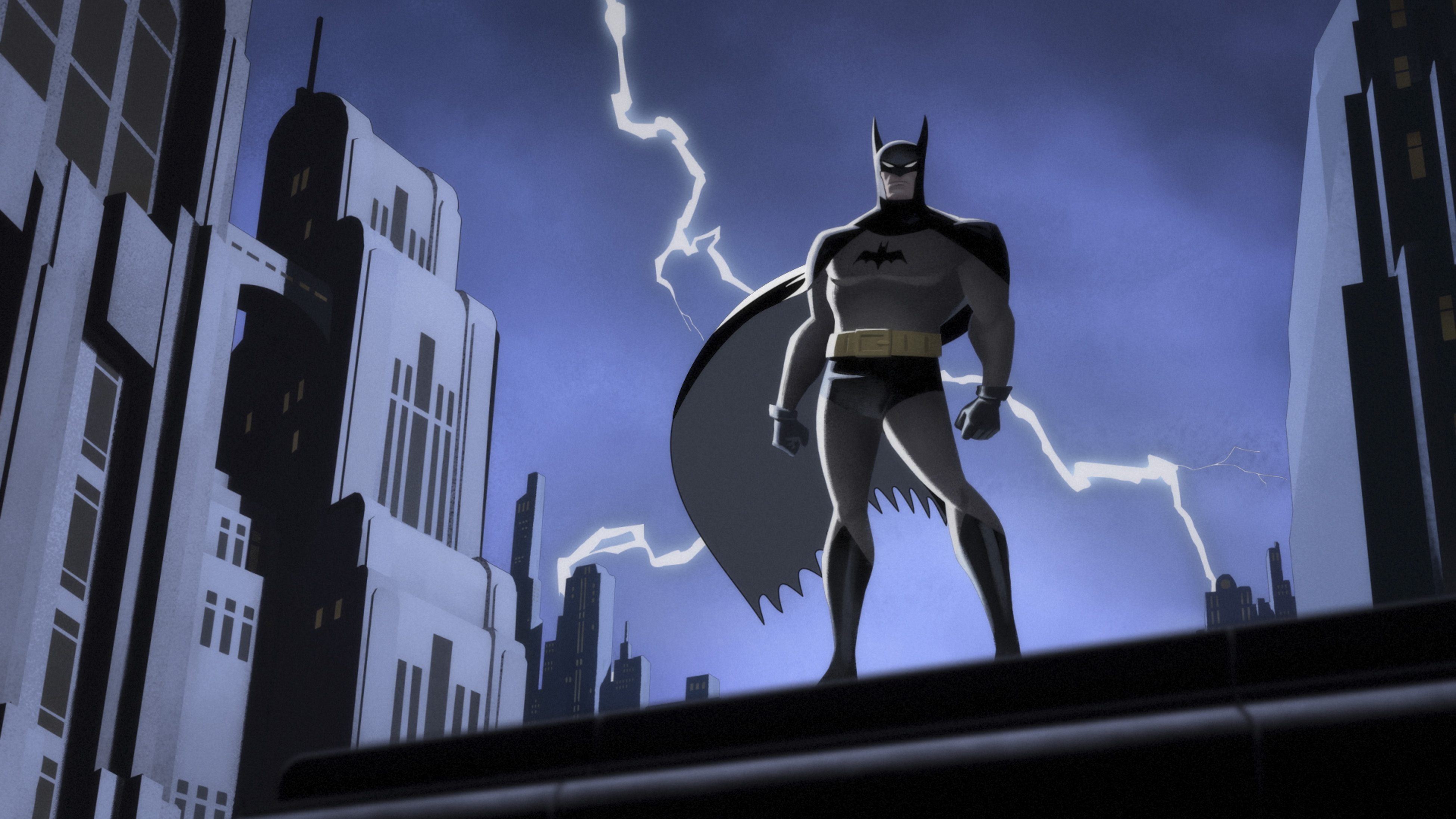 Batman standing on a rooftop in Batman: Caped Crusader